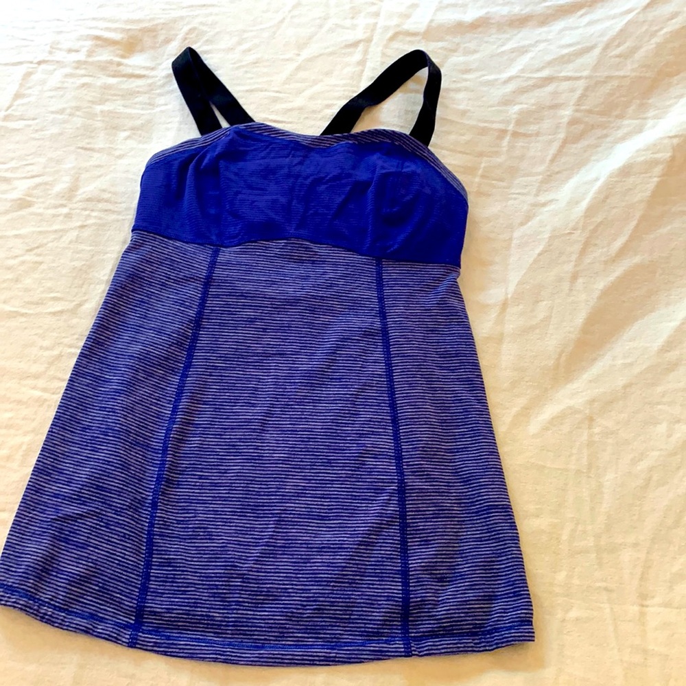 Blue activity wear with black straps. The brand is Lululemon